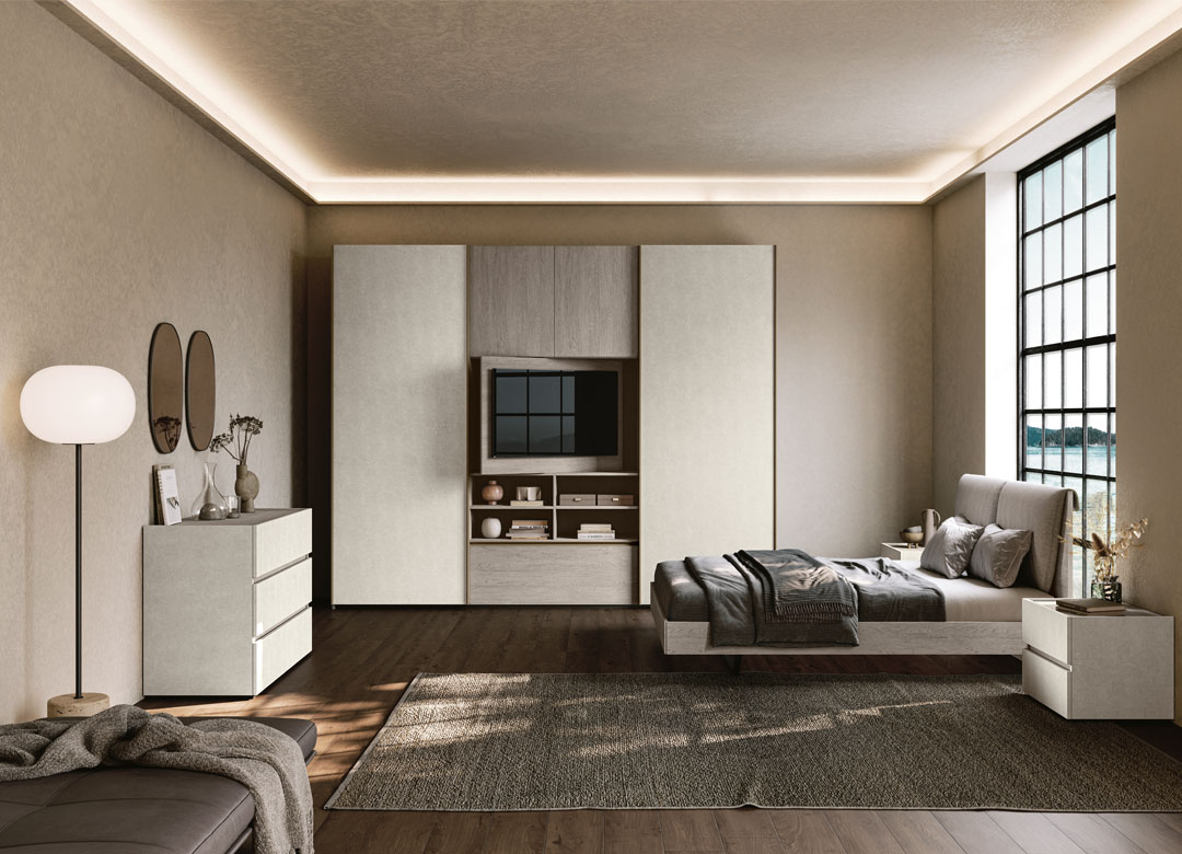 Immagine camera in spatolato Bianco e Rovere gessato e armadio con porta tv