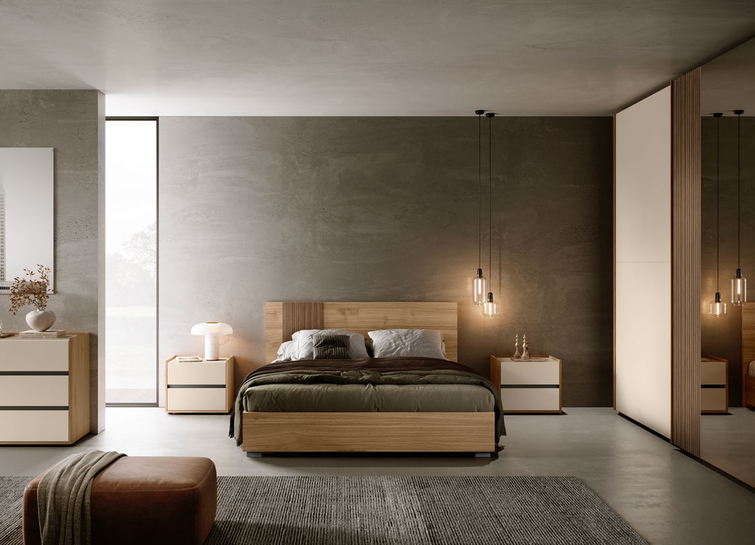 Camera matrimoniale sui toni del legno chiaro con inserti in cannettato marrone